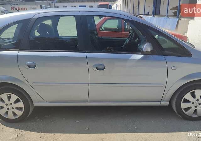 Серый Опель Мерива, объемом двигателя 1.6 л и пробегом 237 тыс. км за 4100 $, фото 7 на Automoto.ua