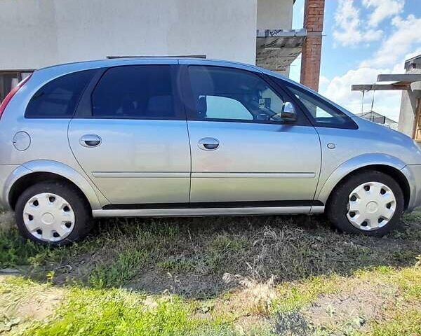 Серый Опель Мерива, объемом двигателя 1.6 л и пробегом 166 тыс. км за 4900 $, фото 12 на Automoto.ua