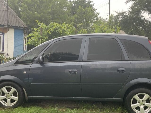 Серый Опель Мерива, объемом двигателя 1.6 л и пробегом 244 тыс. км за 3550 $, фото 5 на Automoto.ua