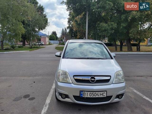 Серый Опель Мерива, объемом двигателя 1.6 л и пробегом 253 тыс. км за 4500 $, фото 3 на Automoto.ua