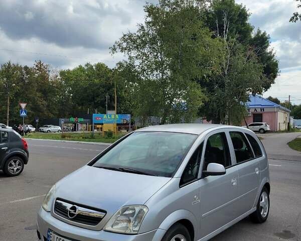 Серый Опель Мерива, объемом двигателя 1.6 л и пробегом 253 тыс. км за 4500 $, фото 7 на Automoto.ua