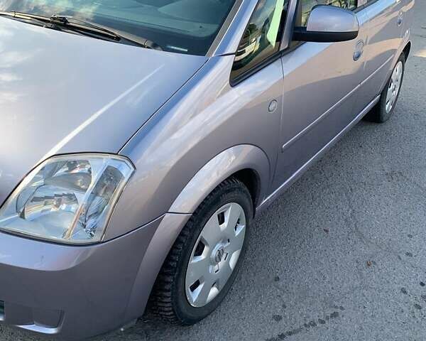 Серый Опель Мерива, объемом двигателя 1.36 л и пробегом 164 тыс. км за 4250 $, фото 24 на Automoto.ua