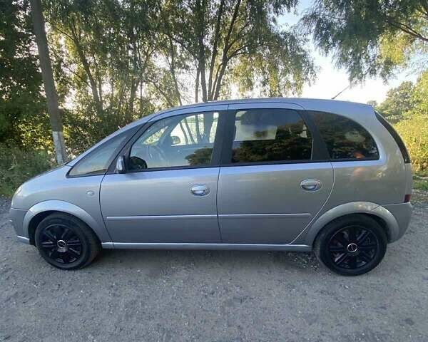 Серый Опель Мерива, объемом двигателя 1.6 л и пробегом 212 тыс. км за 5000 $, фото 2 на Automoto.ua