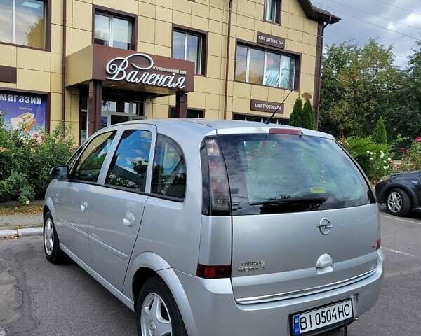 Серый Опель Мерива, объемом двигателя 1.6 л и пробегом 253 тыс. км за 4500 $, фото 2 на Automoto.ua