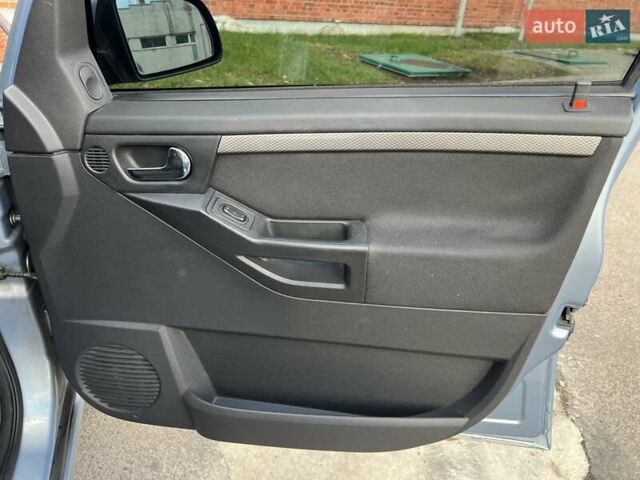 Серый Опель Мерива, объемом двигателя 1.4 л и пробегом 158 тыс. км за 4599 $, фото 39 на Automoto.ua