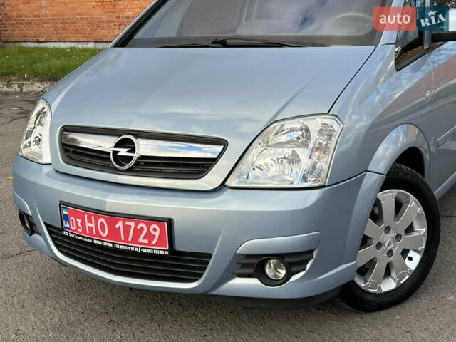 Серый Опель Мерива, объемом двигателя 1.4 л и пробегом 158 тыс. км за 4599 $, фото 4 на Automoto.ua