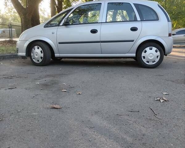 Серый Опель Мерива, объемом двигателя 1.4 л и пробегом 206 тыс. км за 4500 $, фото 6 на Automoto.ua