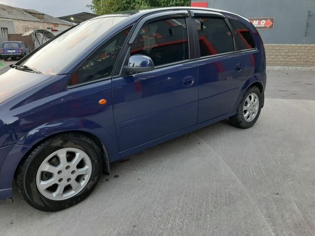 Синий Опель Мерива, объемом двигателя 1.4 л и пробегом 128 тыс. км за 5500 $, фото 3 на Automoto.ua