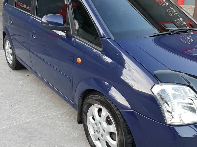 Синий Опель Мерива, объемом двигателя 1.4 л и пробегом 128 тыс. км за 5500 $, фото 2 на Automoto.ua