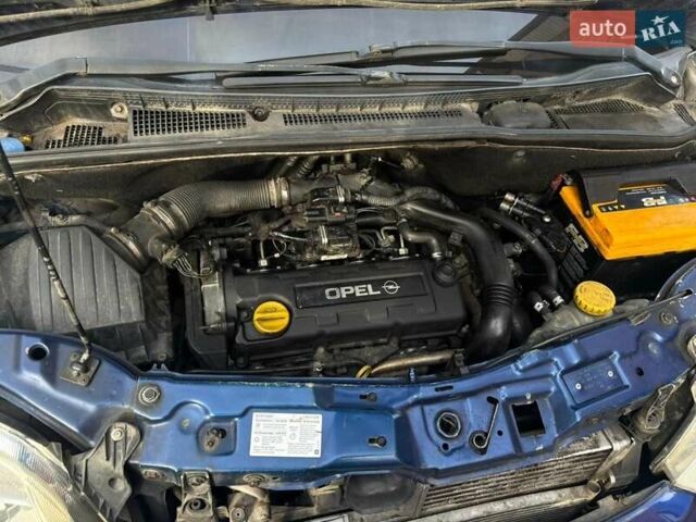 Синий Опель Мерива, объемом двигателя 1.69 л и пробегом 253 тыс. км за 3850 $, фото 14 на Automoto.ua