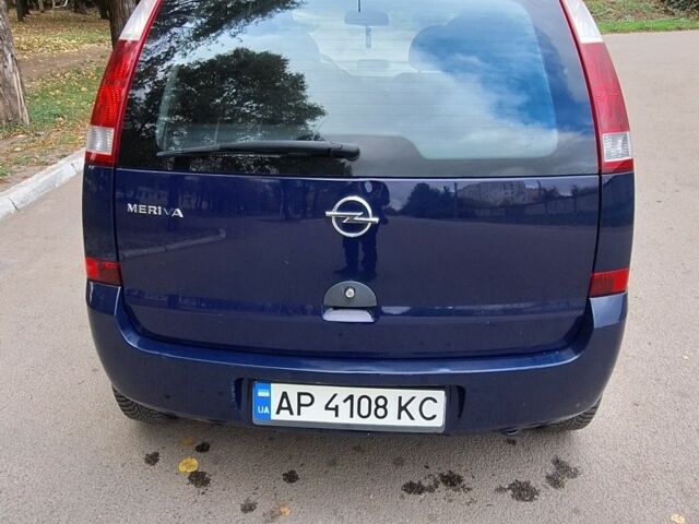 Синий Опель Мерива, объемом двигателя 1.6 л и пробегом 185 тыс. км за 4099 $, фото 5 на Automoto.ua