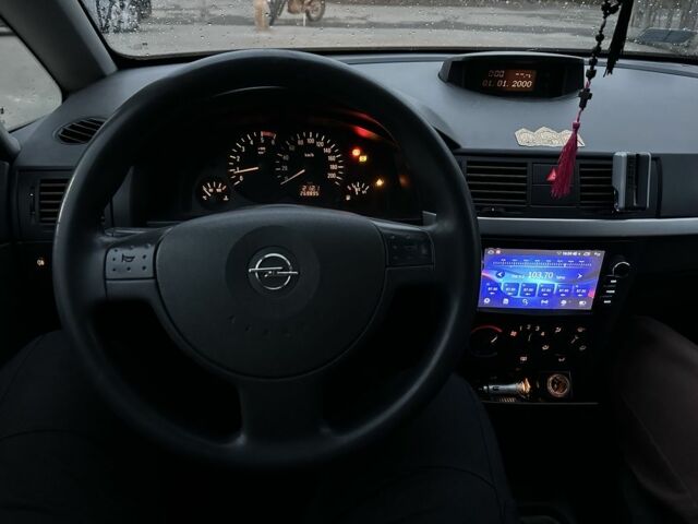 Синий Опель Мерива, объемом двигателя 1.7 л и пробегом 269 тыс. км за 1750 $, фото 7 на Automoto.ua