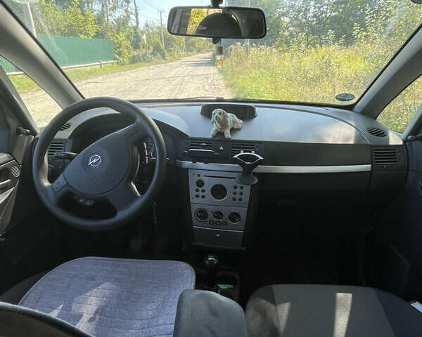 Синий Опель Мерива, объемом двигателя 1.8 л и пробегом 248 тыс. км за 4300 $, фото 5 на Automoto.ua