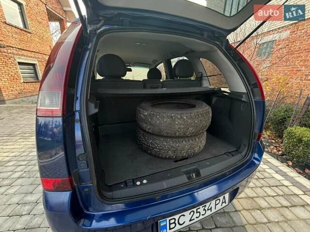 Синий Опель Мерива, объемом двигателя 1.69 л и пробегом 253 тыс. км за 3850 $, фото 13 на Automoto.ua