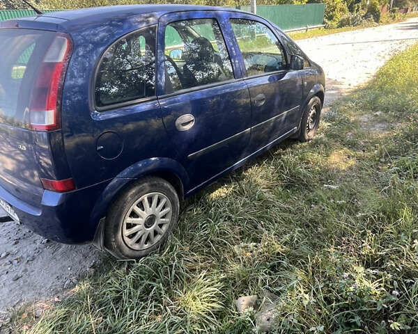 Синий Опель Мерива, объемом двигателя 1.8 л и пробегом 248 тыс. км за 4300 $, фото 2 на Automoto.ua