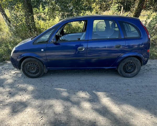 Синий Опель Мерива, объемом двигателя 1.8 л и пробегом 248 тыс. км за 4300 $, фото 3 на Automoto.ua