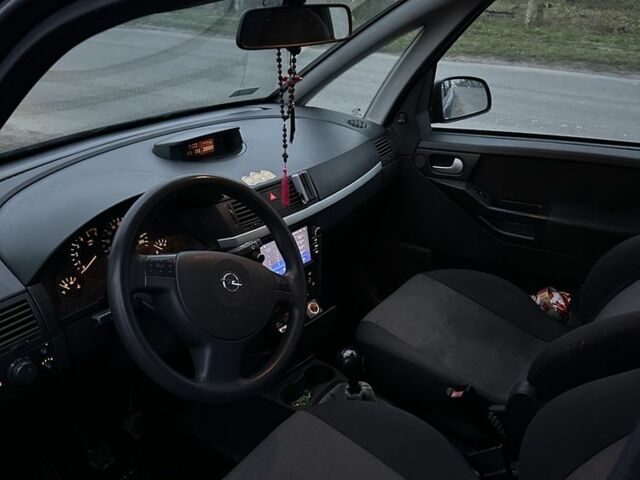 Синий Опель Мерива, объемом двигателя 1.7 л и пробегом 269 тыс. км за 1750 $, фото 5 на Automoto.ua