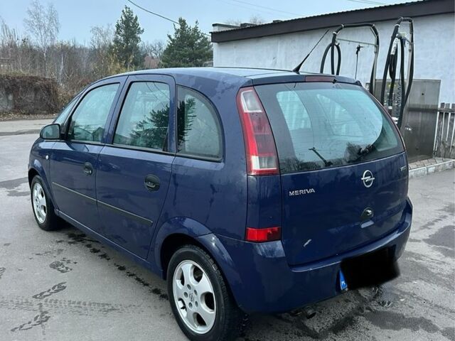 Синий Опель Мерива, объемом двигателя 1.7 л и пробегом 269 тыс. км за 1750 $, фото 4 на Automoto.ua