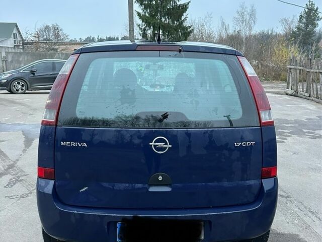 Синий Опель Мерива, объемом двигателя 1.7 л и пробегом 269 тыс. км за 1750 $, фото 3 на Automoto.ua