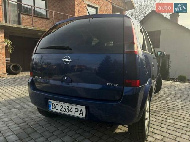 Синий Опель Мерива, объемом двигателя 1.69 л и пробегом 253 тыс. км за 3850 $, фото 8 на Automoto.ua