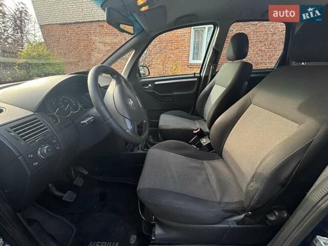 Синий Опель Мерива, объемом двигателя 1.69 л и пробегом 253 тыс. км за 3850 $, фото 20 на Automoto.ua