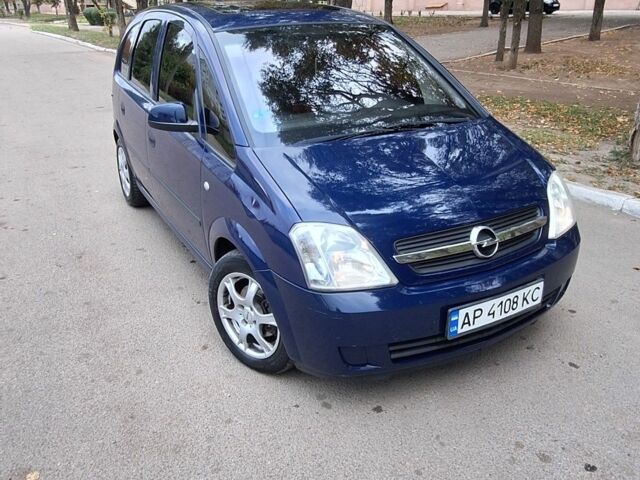 Синий Опель Мерива, объемом двигателя 1.6 л и пробегом 185 тыс. км за 4099 $, фото 1 на Automoto.ua