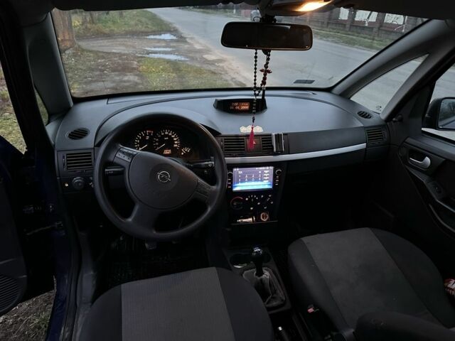 Синий Опель Мерива, объемом двигателя 1.7 л и пробегом 269 тыс. км за 1750 $, фото 6 на Automoto.ua