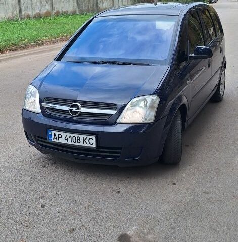 Синий Опель Мерива, объемом двигателя 1.6 л и пробегом 185 тыс. км за 4099 $, фото 3 на Automoto.ua
