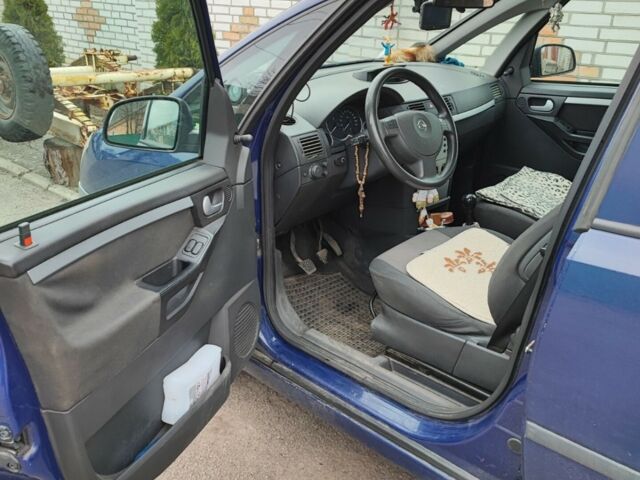 Синий Опель Мерива, объемом двигателя 1.6 л и пробегом 280 тыс. км за 3900 $, фото 6 на Automoto.ua