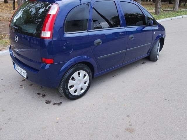 Синий Опель Мерива, объемом двигателя 1.6 л и пробегом 185 тыс. км за 4099 $, фото 6 на Automoto.ua