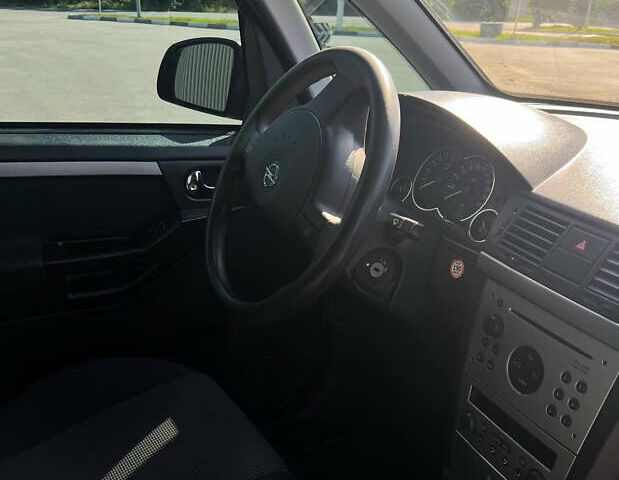 Синий Опель Мерива, объемом двигателя 1.6 л и пробегом 240 тыс. км за 3850 $, фото 13 на Automoto.ua