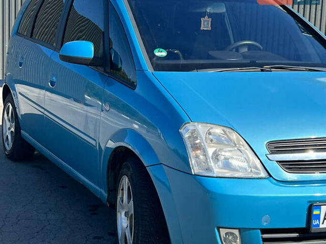 Синий Опель Мерива, объемом двигателя 1.6 л и пробегом 240 тыс. км за 3850 $, фото 8 на Automoto.ua