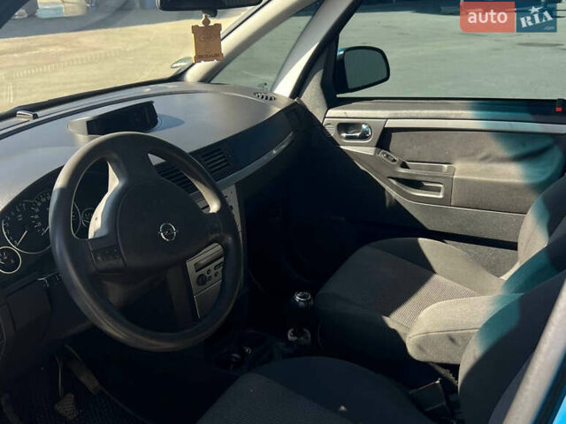 Синий Опель Мерива, объемом двигателя 1.6 л и пробегом 240 тыс. км за 3850 $, фото 18 на Automoto.ua