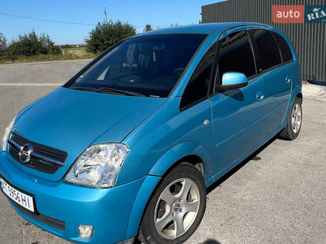Синий Опель Мерива, объемом двигателя 1.6 л и пробегом 240 тыс. км за 3850 $, фото 9 на Automoto.ua