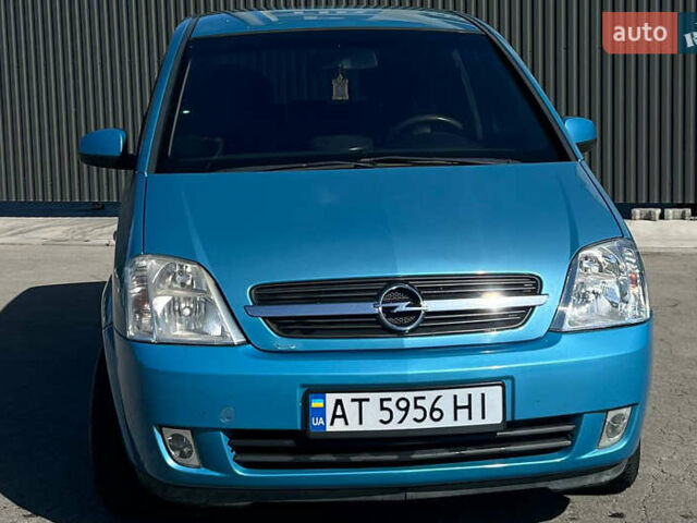 Синий Опель Мерива, объемом двигателя 1.6 л и пробегом 240 тыс. км за 3850 $, фото 2 на Automoto.ua