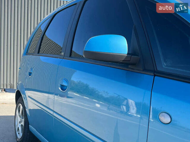 Синий Опель Мерива, объемом двигателя 1.6 л и пробегом 240 тыс. км за 3850 $, фото 10 на Automoto.ua