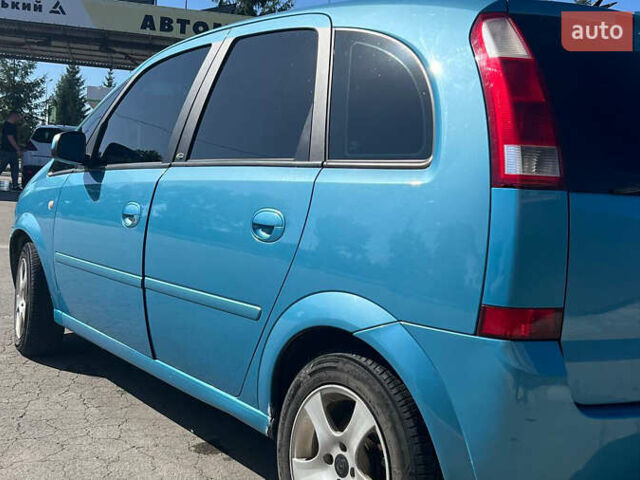 Синий Опель Мерива, объемом двигателя 1.6 л и пробегом 240 тыс. км за 3850 $, фото 14 на Automoto.ua