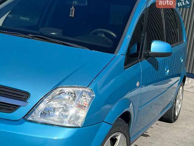 Синий Опель Мерива, объемом двигателя 1.6 л и пробегом 240 тыс. км за 3850 $, фото 5 на Automoto.ua
