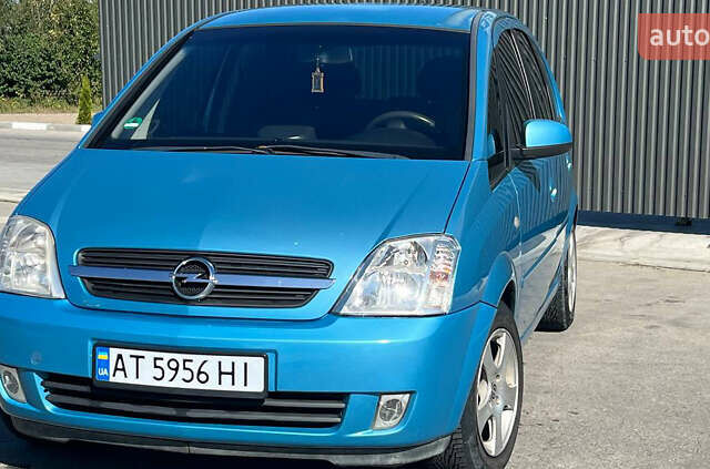 Синий Опель Мерива, объемом двигателя 1.6 л и пробегом 240 тыс. км за 3850 $, фото 1 на Automoto.ua