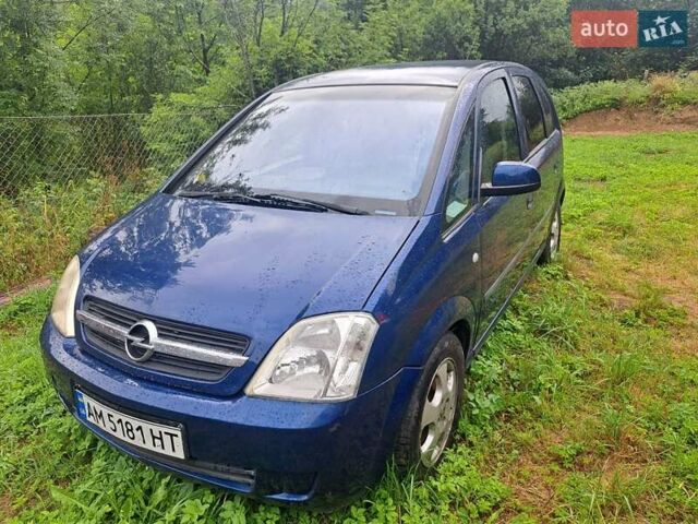 Синий Опель Мерива, объемом двигателя 1.8 л и пробегом 160 тыс. км за 3200 $, фото 1 на Automoto.ua