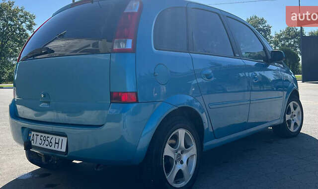 Синий Опель Мерива, объемом двигателя 1.6 л и пробегом 240 тыс. км за 3850 $, фото 11 на Automoto.ua