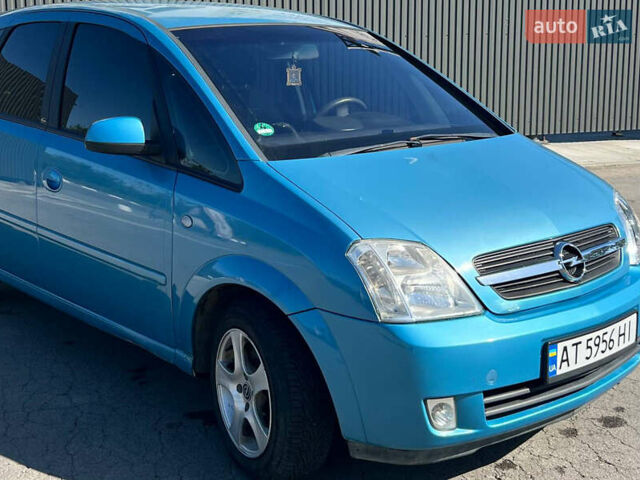 Синий Опель Мерива, объемом двигателя 1.6 л и пробегом 240 тыс. км за 3850 $, фото 6 на Automoto.ua