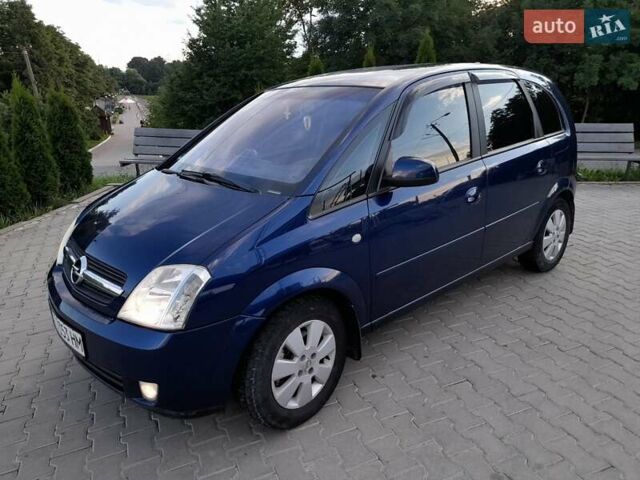 Синий Опель Мерива, объемом двигателя 1.6 л и пробегом 280 тыс. км за 3800 $, фото 2 на Automoto.ua