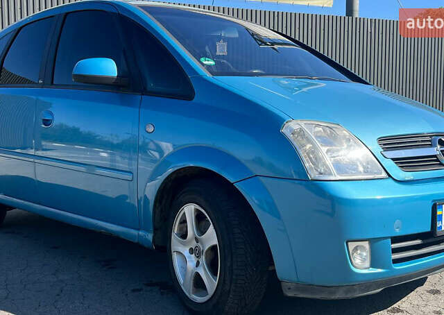 Синий Опель Мерива, объемом двигателя 1.6 л и пробегом 240 тыс. км за 3850 $, фото 7 на Automoto.ua
