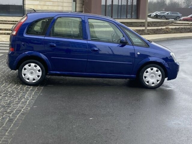 Синий Опель Мерива, объемом двигателя 1.2 л и пробегом 400 тыс. км за 3200 $, фото 3 на Automoto.ua