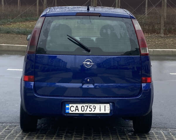 Синій Опель Меріва, об'ємом двигуна 1.2 л та пробігом 400 тис. км за 2899 $, фото 3 на Automoto.ua