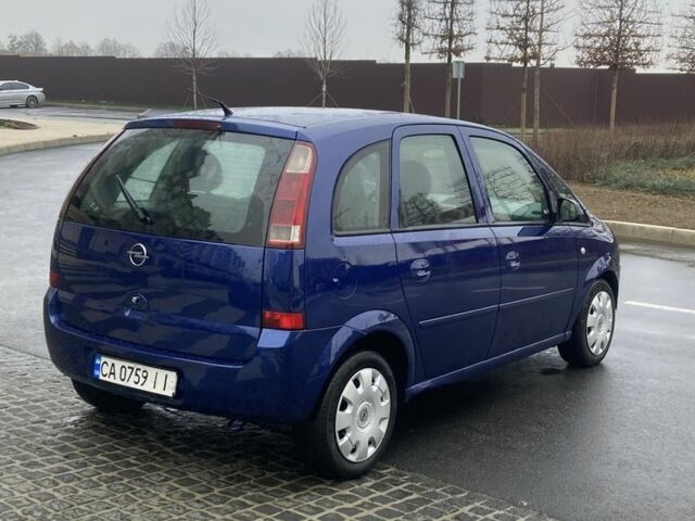 Синий Опель Мерива, объемом двигателя 1.2 л и пробегом 400 тыс. км за 3200 $, фото 4 на Automoto.ua
