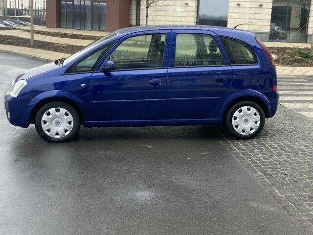 Синий Опель Мерива, объемом двигателя 1.2 л и пробегом 400 тыс. км за 3200 $, фото 1 на Automoto.ua