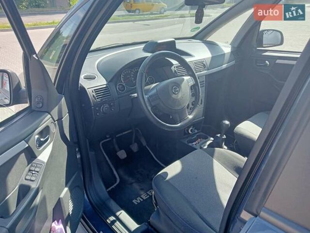 Синий Опель Мерива, объемом двигателя 1.36 л и пробегом 242 тыс. км за 4158 $, фото 4 на Automoto.ua
