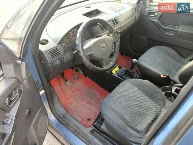 Синий Опель Мерива, объемом двигателя 1.25 л и пробегом 255 тыс. км за 4100 $, фото 5 на Automoto.ua
